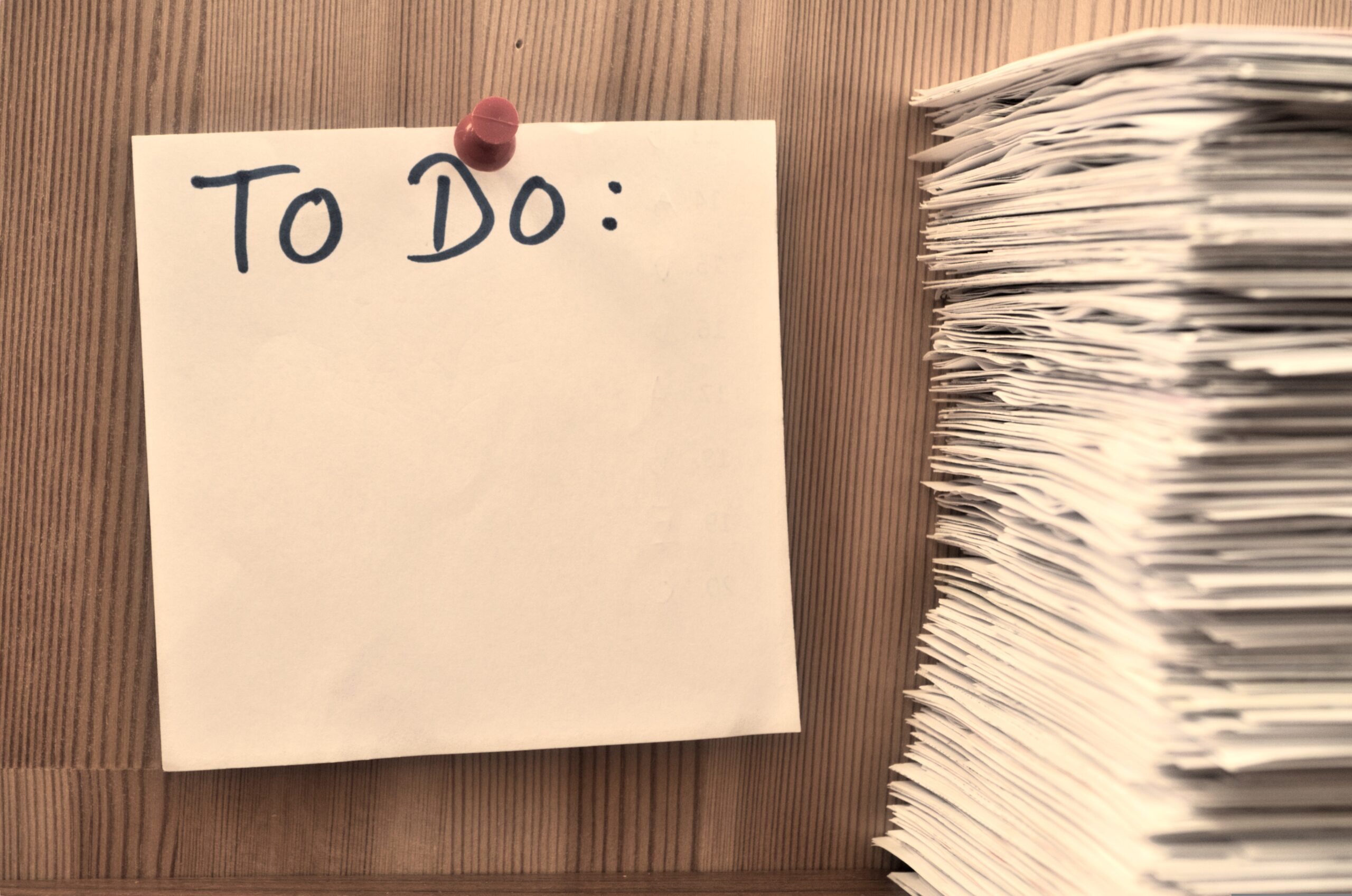 Content checklist with To Do list pinned to wall